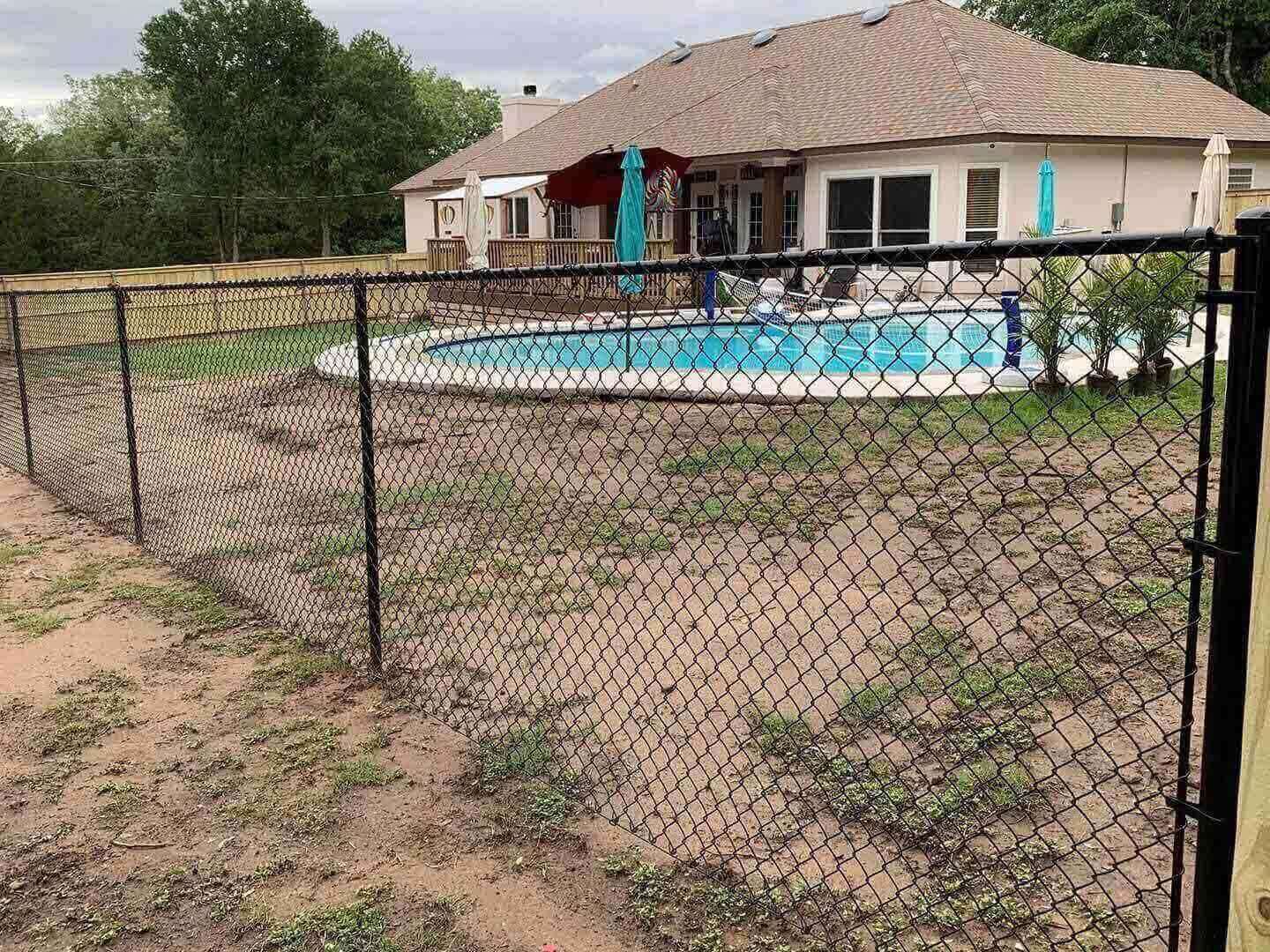 Photo of a chain link fence in Bastrop County, Texas