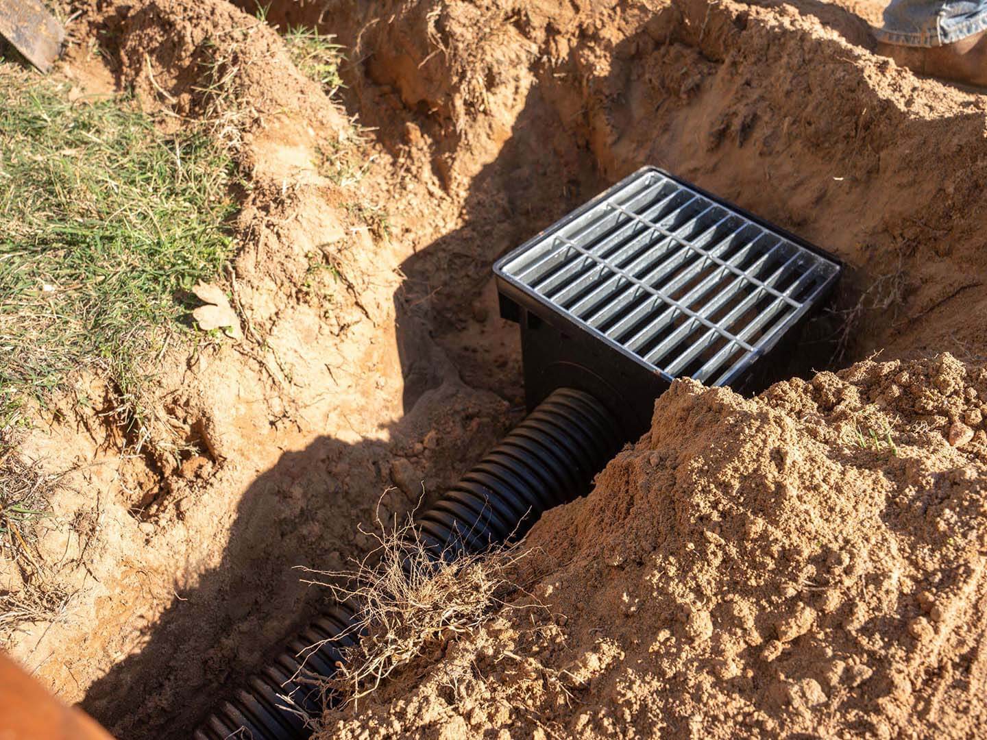 Photo of a French drain from a Bastrop TX fence company