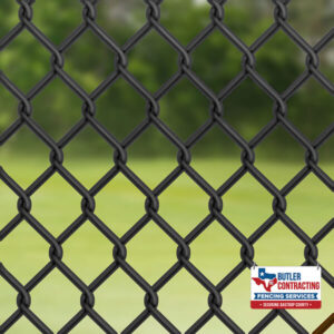 Photo of vinyl coated chain link fence Bastrop County TX