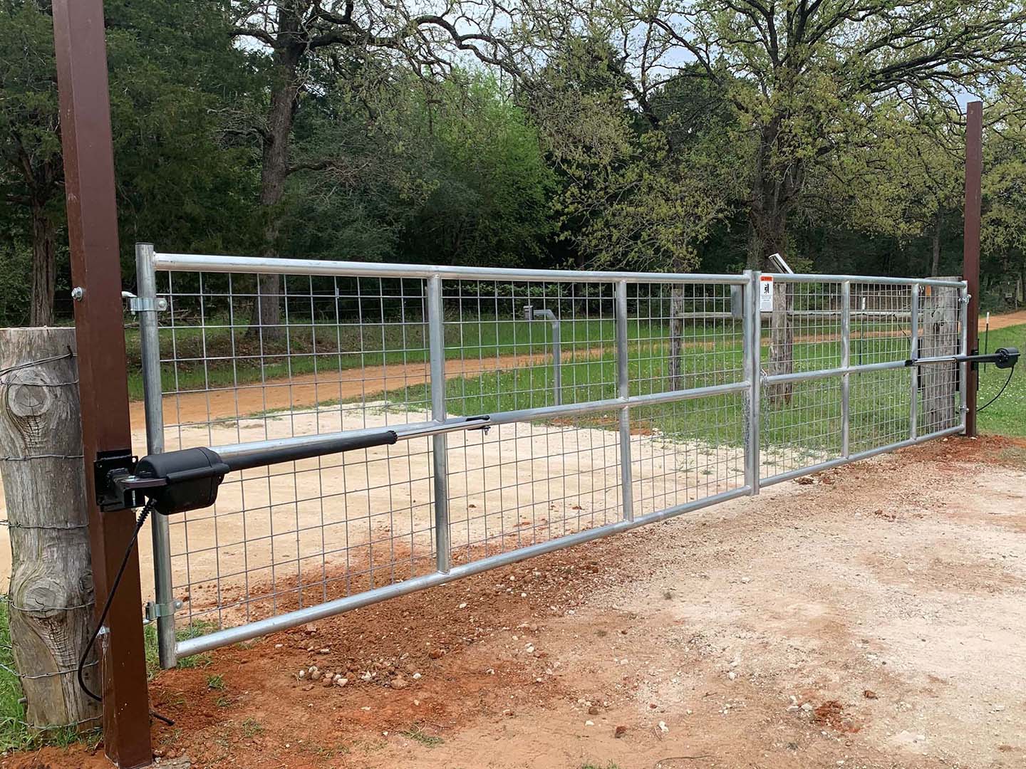 Photo of an automatic gate from a Bastrop County Texas fence company