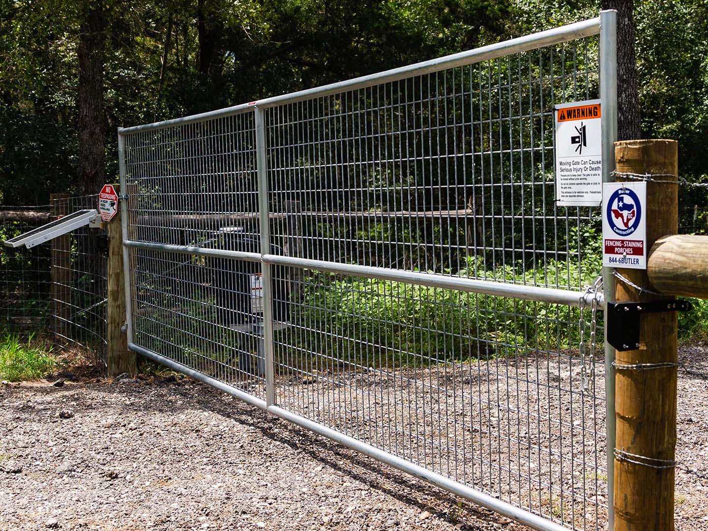 Photo of an automatic gate from a Bastrop County Texas fence company