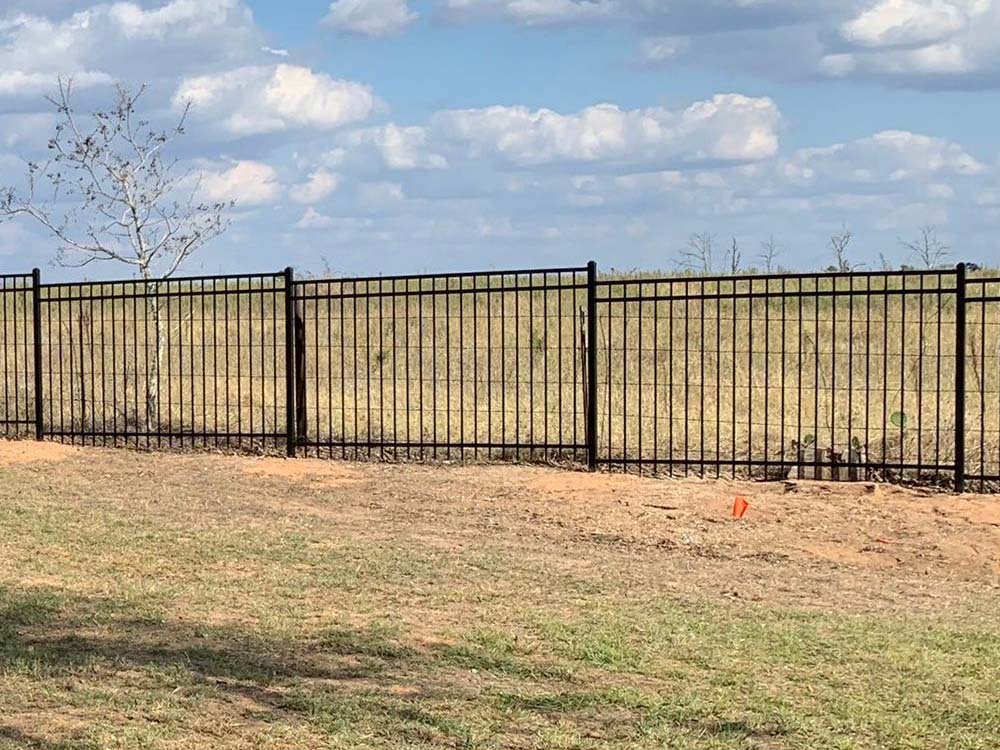 Photo of an aluminum fence from a Bastrop County Texas fence company