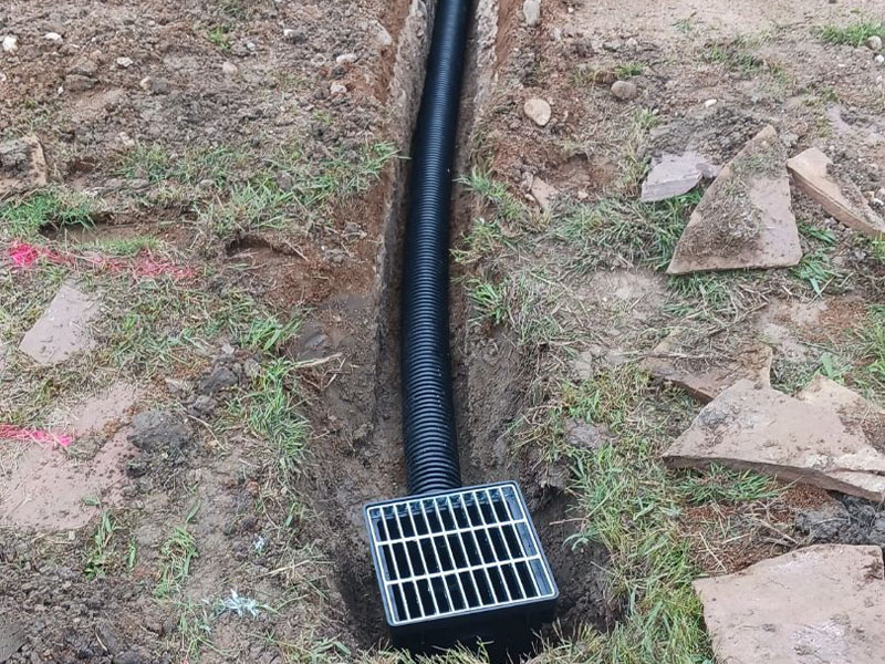 Outdoor drain digging company in Bastrop Texas