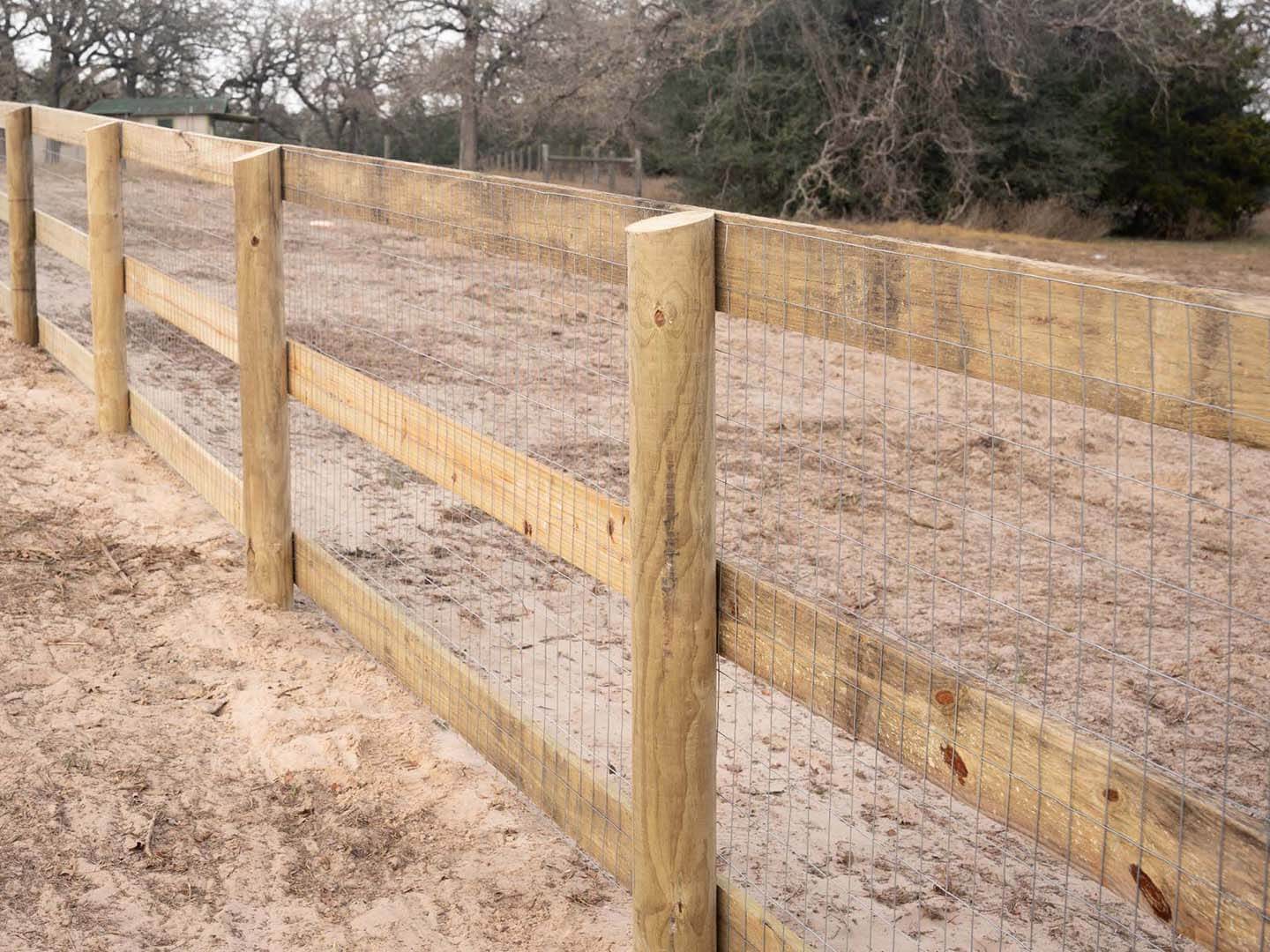Custom Wood Farm Fence Contractor in Bastrop County