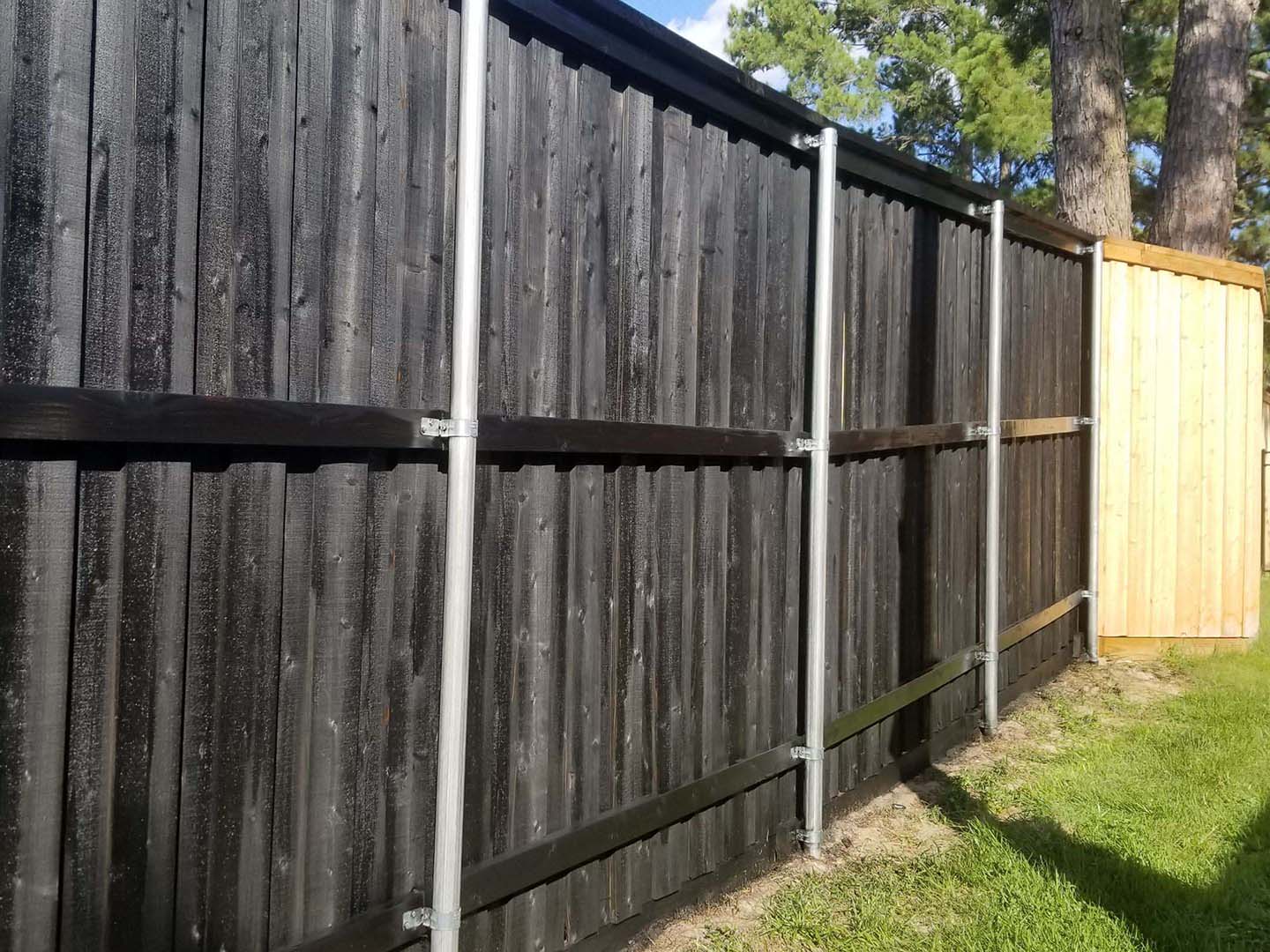 Bastrop County TX cap and trim wood fence